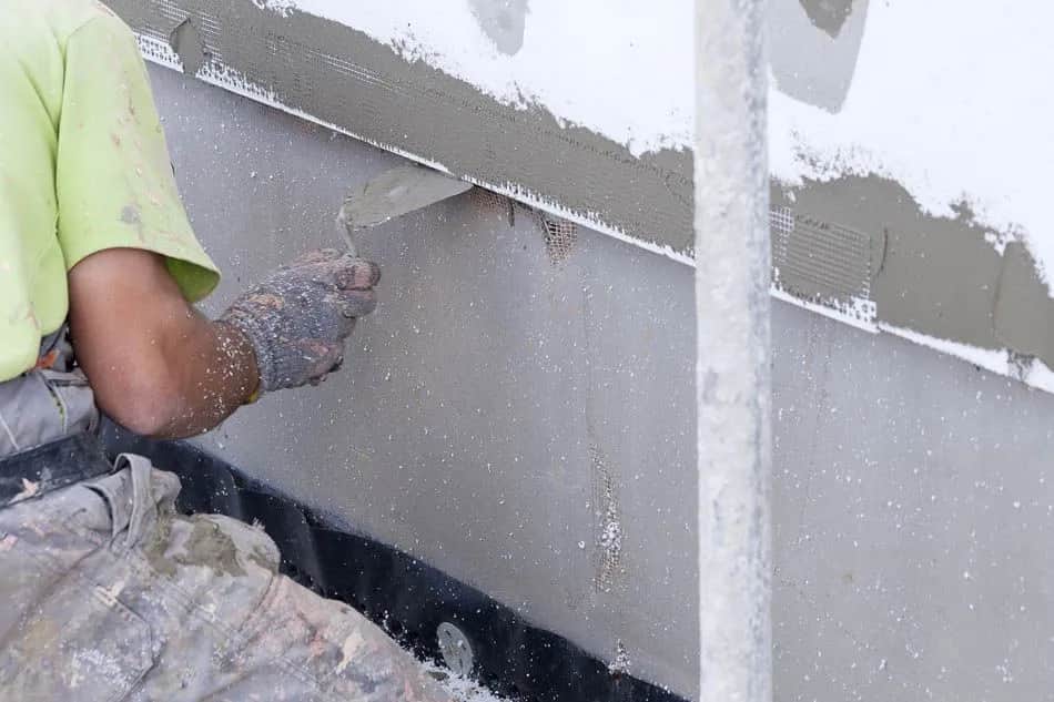 Po co siatka pod tynk? Odkryj jej kluczowe zalety i zastosowania